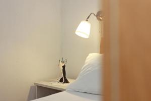 Postel nebo postele na pokoji v ubytování Apartments Omo 1