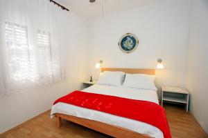Postel nebo postele na pokoji v ubytování Apartments Omo 1