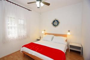 Postel nebo postele na pokoji v ubytování Apartments Omo 1