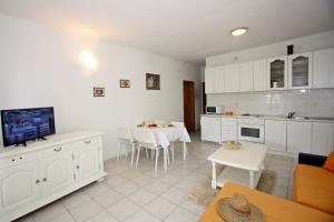 Kuchyň nebo kuchyňský kout v ubytování Apartments Omo 1