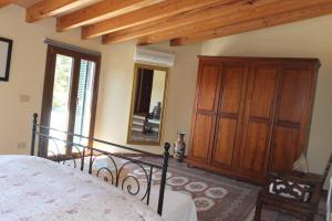 Postel nebo postele na pokoji v ubytování Villa Maria, bonita casa con jardín y piscina privada en Andratx + 12 fotografií