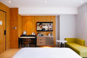 Postelja oz. postelje v sobi nastanitve Mercure Tangerang BSD City