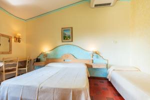 A bed or beds in a room at Costa Dorada