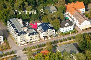 een luchtzicht op een woonwijk met huizen bij Apartment-Seemoewe-1A-Standlage-nur-150m-mit-Parkplatz in Baabe