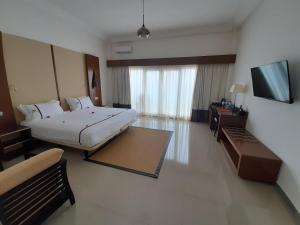 Postel nebo postele na pokoji v ubytování Iris Hotel