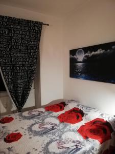 Posteľ alebo postele v izbe v ubytovaní Rosso rubino