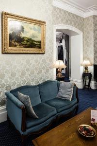 Ein Sitzbereich in der Unterkunft Best Western Swiss Cottage Hotel