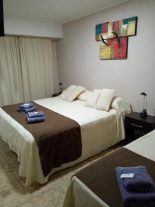 Ένα ή περισσότερα κρεβάτια σε δωμάτιο στο Hotel Silver Golf