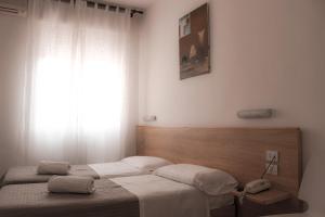 Letto o letti in una camera di Albergo Moderno