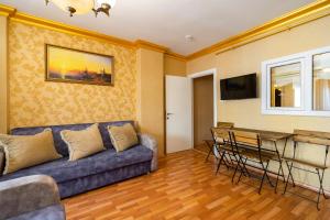 a living room with a couch and a table at Kervanchi in Istanbul