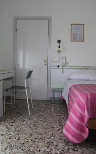 Letto o letti in una camera di Albergo Moderno