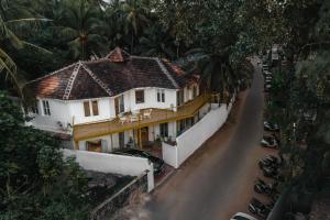an aerial view of a house on a road at Morii by the sea - Morjim Beach in Morjim