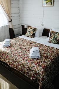  Кровать или кровати в номере Бутик Отель Маруся 