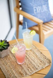 two drinks on a tray on a table at Compass Hotel by Margaritaville Anna Maria Sound in Bradenton