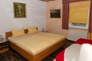 Cama ou camas em um quarto em Ferienwohnung-in-Sassnitz-fuer-4-Personen
