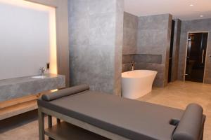 a bathroom with a sink and a bath tub at NG Enjoy in Sapanca