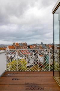 a balcony with a view of a city at Savoie in Brussels