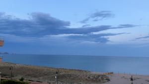 a view of a blue sky and the beach at Paraíso Playa de Pals - reformado primera línea de mar con parking in Pals