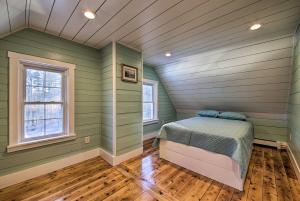 A bed or beds in a room at Riverfront Coastal Escape with Deep Water Dock!