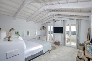 Postel nebo postele na pokoji v ubytování Torre Vella Fontenille Menorca