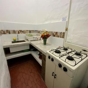 Kuchyň nebo kuchyňský kout v ubytování Posada Turistica Nakku