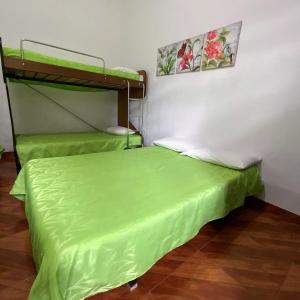 Postel nebo postele na pokoji v ubytování Posada Turistica Nakku