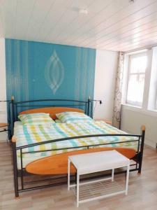 Ferienwohnung-Margarete tesisinde bir odada yatak veya yataklar