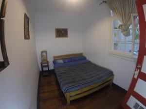 Postel nebo postele na pokoji v ubytování Lemuria Hostel