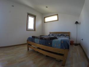 Postel nebo postele na pokoji v ubytování Lemuria Hostel