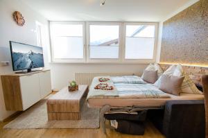 Una cama o camas en una habitación de Apartment Nature & Friends