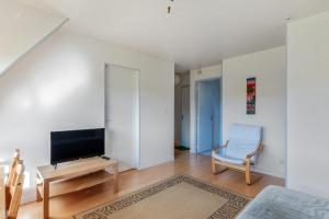 Televisyen dan/atau pusat hiburan di Appartement Vallon - Welkeys