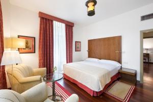 Postel nebo postele na pokoji v ubytování Parador de Limpias