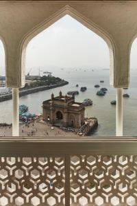 a view from a window of a building in the water at The Taj Mahal Tower, Mumbai in Mumbai