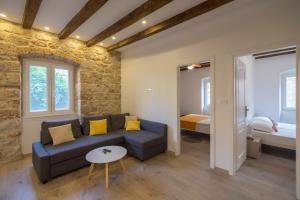 Postel nebo postele na pokoji v ubytování Apartments Bepi