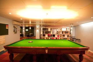 a billiard room with a pool table in it at Kangaroo Inn in Perth