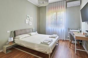Postel nebo postele na pokoji v ubytování Lapilanoa - Suite & Pool + 20 fotografií