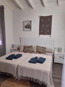 Ein Bett oder Betten in einem Zimmer der Unterkunft Casa Verano eterno, Villa tot 16 personen
