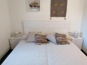Ein Bett oder Betten in einem Zimmer der Unterkunft Casa Verano eterno, Villa tot 16 personen