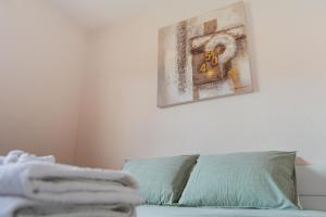 Posteľ alebo postele v izbe v ubytovaní SolApartment