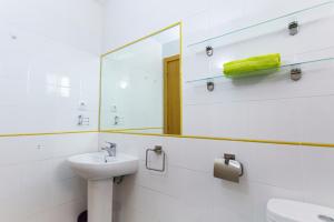 Kúpeľňa v ubytovaní SolApartment