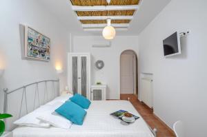 Letto o letti in una camera di Adriani Hotel