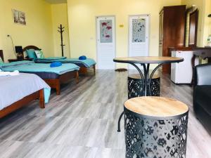 Postel nebo postele na pokoji v ubytování Sunrise Beach Kohyao Resort