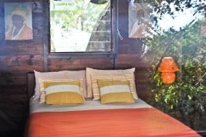 Postel nebo postele na pokoji v ubytování Tree Lodge Mauritius