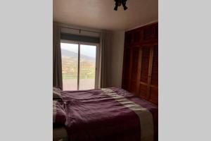 Posteľ alebo postele v izbe v ubytovaní Casa con piscina privada. Mirador de Humbolt.