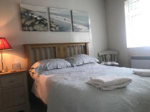 Ένα ή περισσότερα κρεβάτια σε δωμάτιο στο White Lodge +15 φωτογραφίες