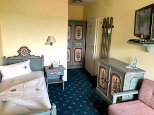 TV a/nebo společenská místnost v ubytování Berggasthof Hotel Igelwirt