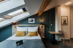 Posteľ alebo postele v izbe v ubytovaní Hotel 32 Kraków Old Town