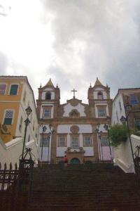 a large building with a cross on top of it at Luna Bahia Pousada in Salvador