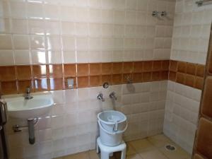 Un baño de Back To Nest Homestay