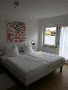 Lova arba lovos apgyvendinimo įstaigoje Ferienwohnung-4-im-Haus-Wildfang